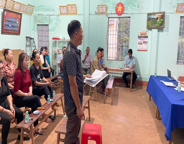 '''''A group of people in a room

Description automatically generated'''''